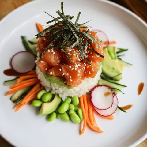Vibrant poke bowl with fresh tuna, creamy avocado, and colorful vegetables ready to enjoy.